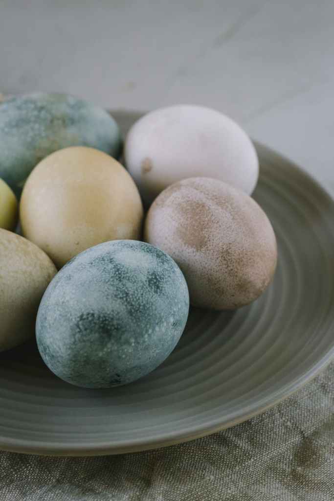assorted color easter eggs on plate