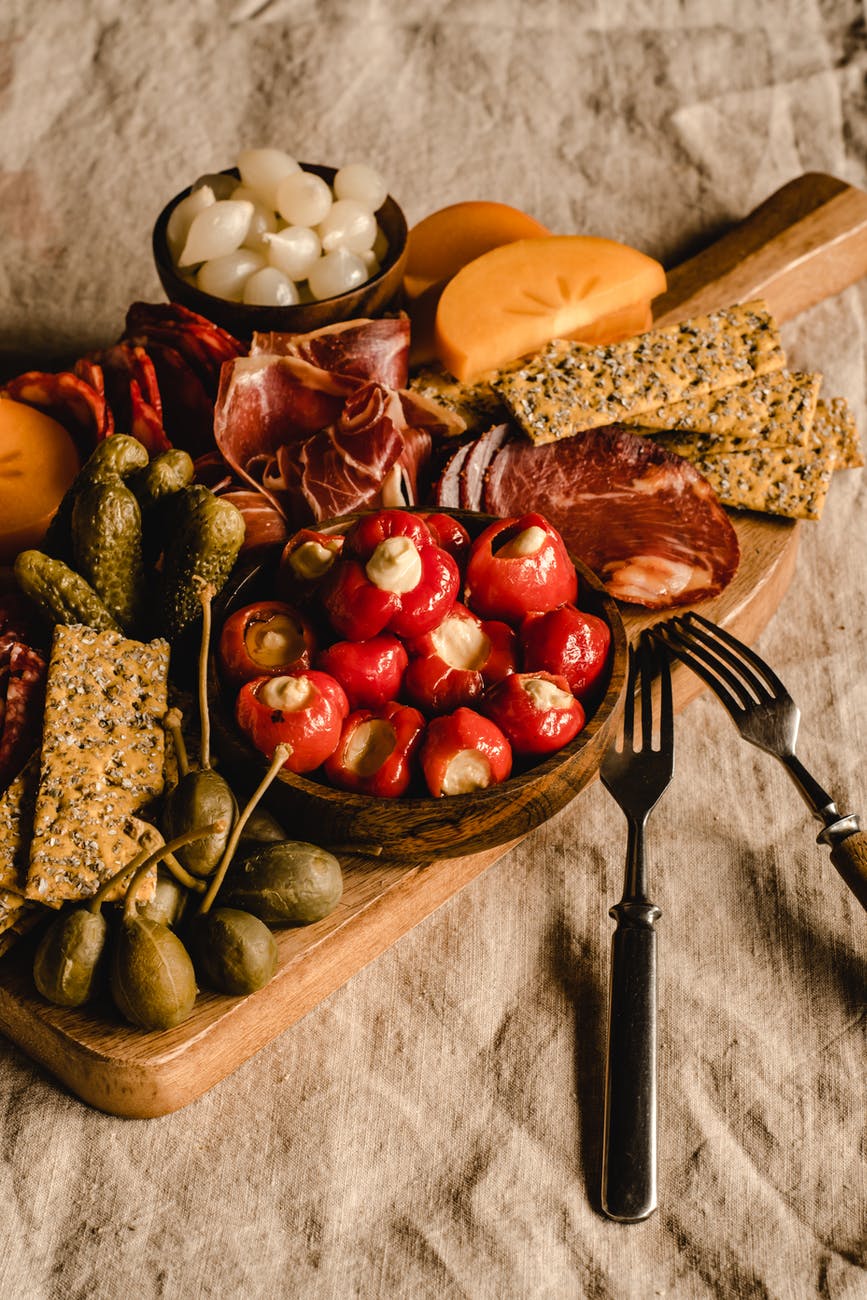 sliced fruits on brown wooden chopping board